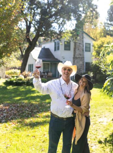 Jeremy Nickel and friend in front of Baldridge House